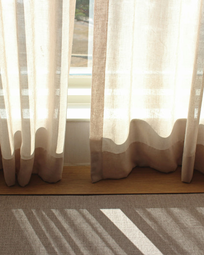 Les 3 astuces pour réduire vos rideaux sans les couper